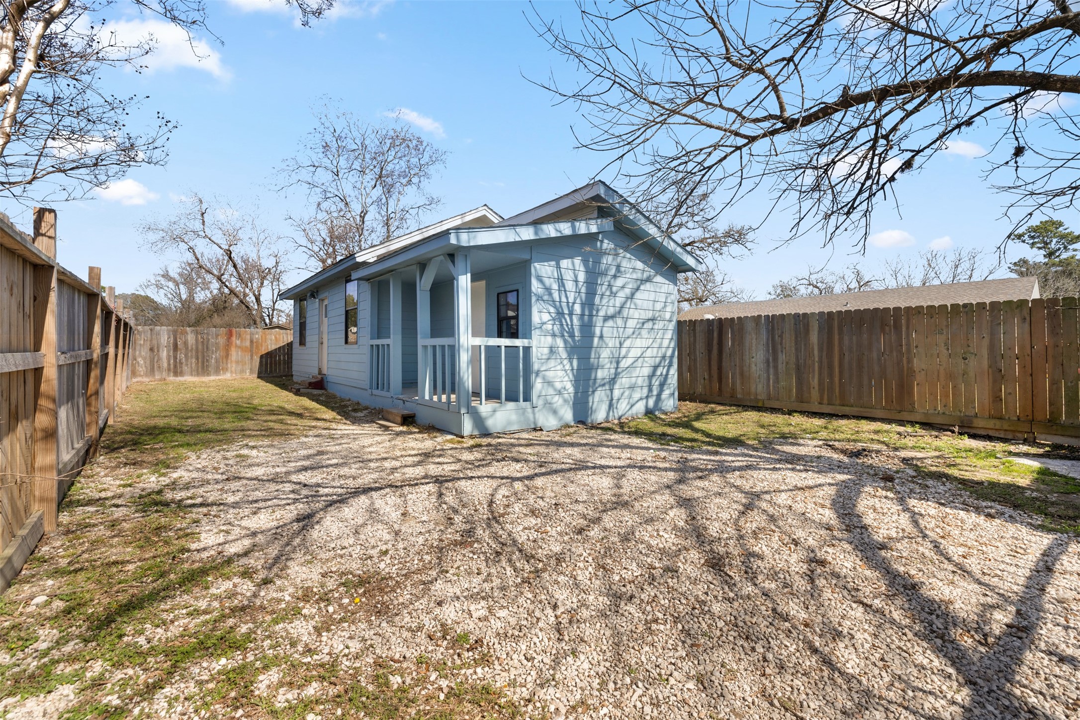 9802 Lum Lane Houston, TX 77078 - Photo 26 of 45 A view of the guest home surrounded by privacy fence