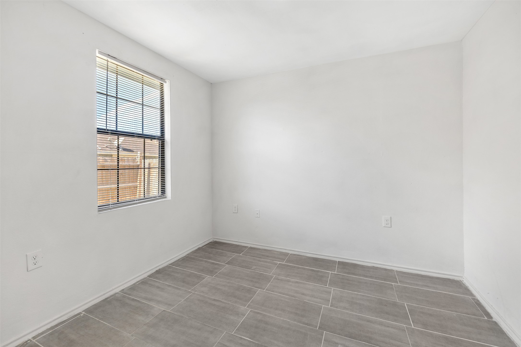9802 Lum Lane Houston, TX 77078 - Photo 28 of 45 One of two bedrooms in the guest house. No carpet here either!