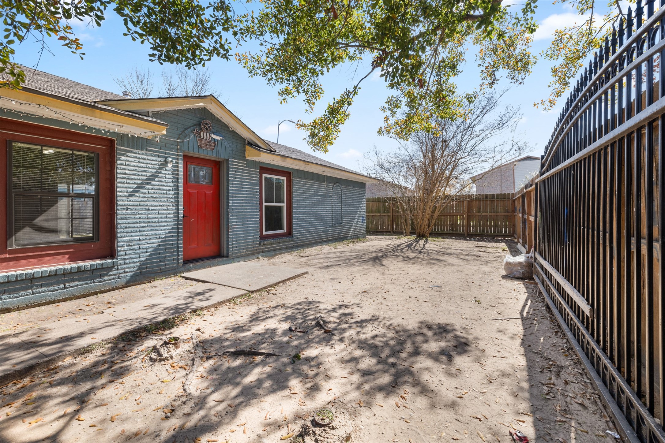 9802 Lum Lane Houston, TX 77078 - Photo 43 of 45 Your next home comes with a manned metal gate for strong security and privacy. Book your showing today!