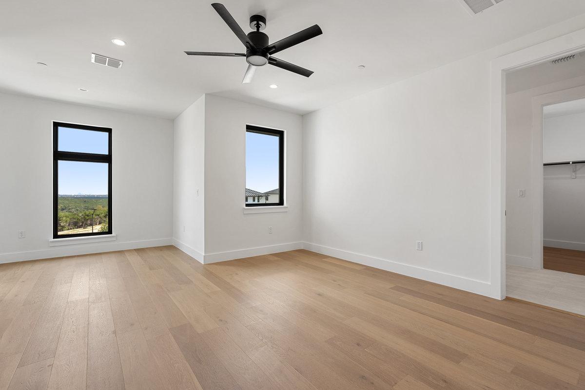6010 Adhara Pass Austin, TX 78730 - Photo 27 of 38 wooden floor in an empty room with a window
