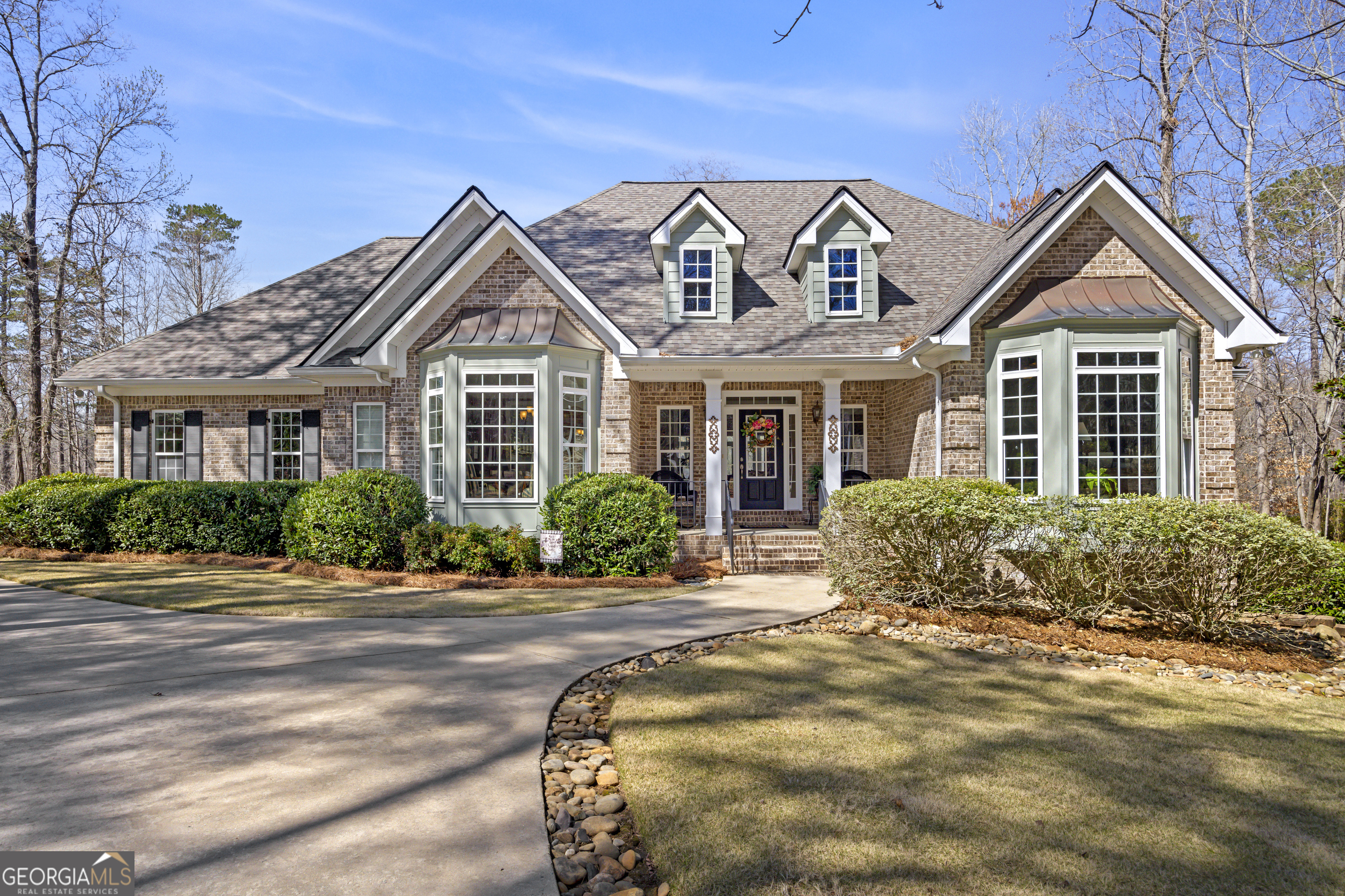 1070 Apalachee Trace Bishop, GA 30621 - Photo 1 of 1 a front view of a house with a yard