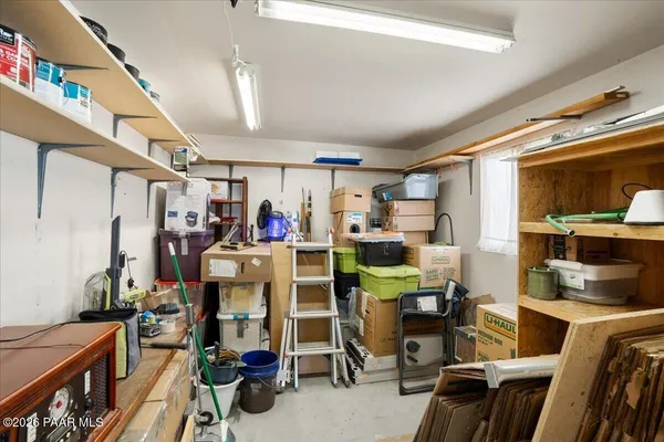 a view of a room with lots of furniture and lots of furniture