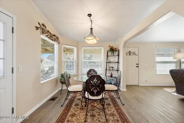 a workspace with wooden floor