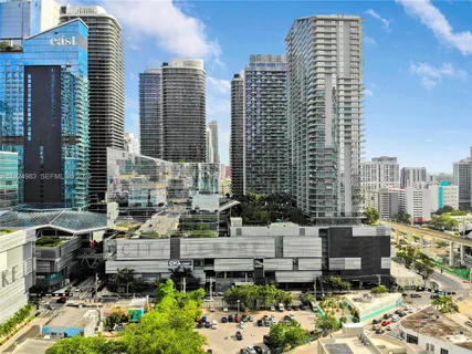 a view of a city with tall buildings