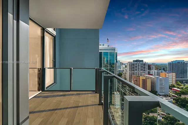 a view of a balcony with city view