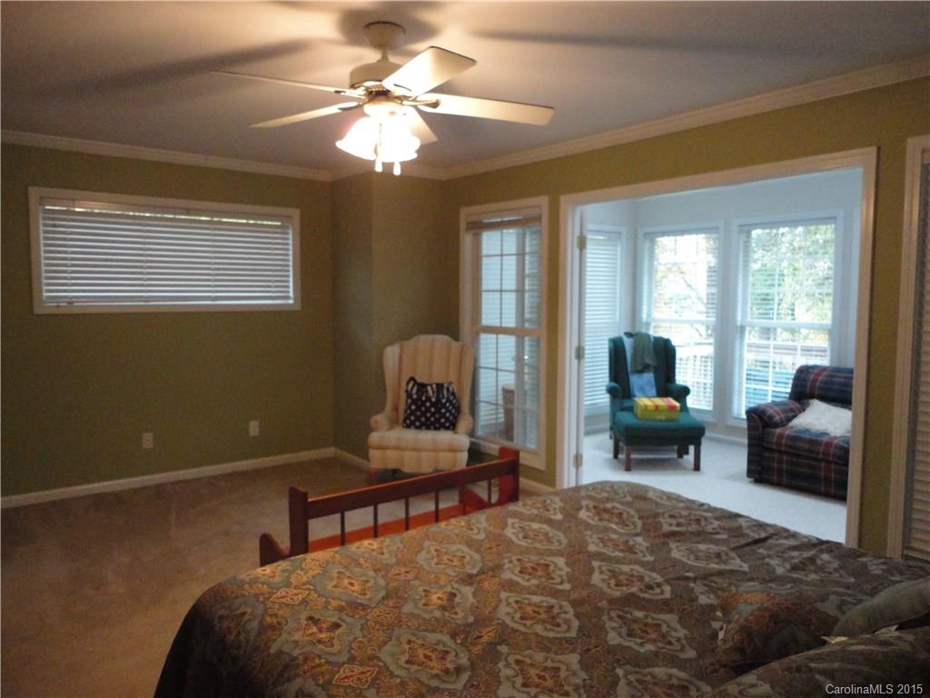 2675 Island View Road, Unit 1 Fort Mill, SC 29708 - Photo 11 of 24 a bedroom with a bed and a couch