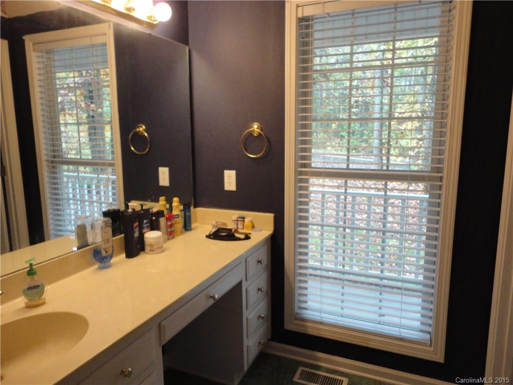 2675 Island View Road, Unit 1 Fort Mill, SC 29708 - Photo 13 of 24 a bathroom with a granite countertop sink and a window