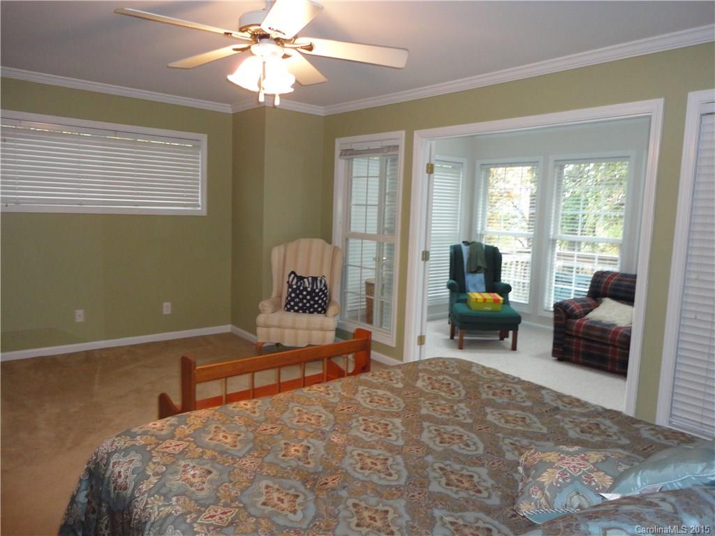 2675 Island View Road, Unit 1 Fort Mill, SC 29708 - Photo 15 of 24 a living room with furniture and a chandelier