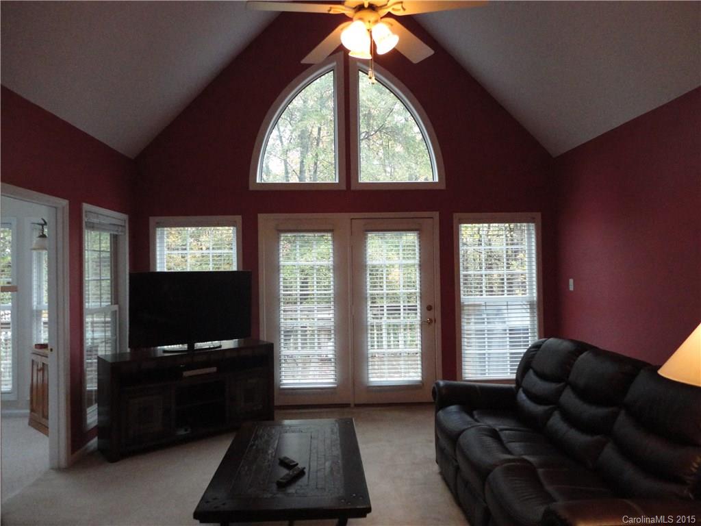 2675 Island View Road, Unit 1 Fort Mill, SC 29708 - Photo 19 of 24 a living room with furniture and a flat screen tv