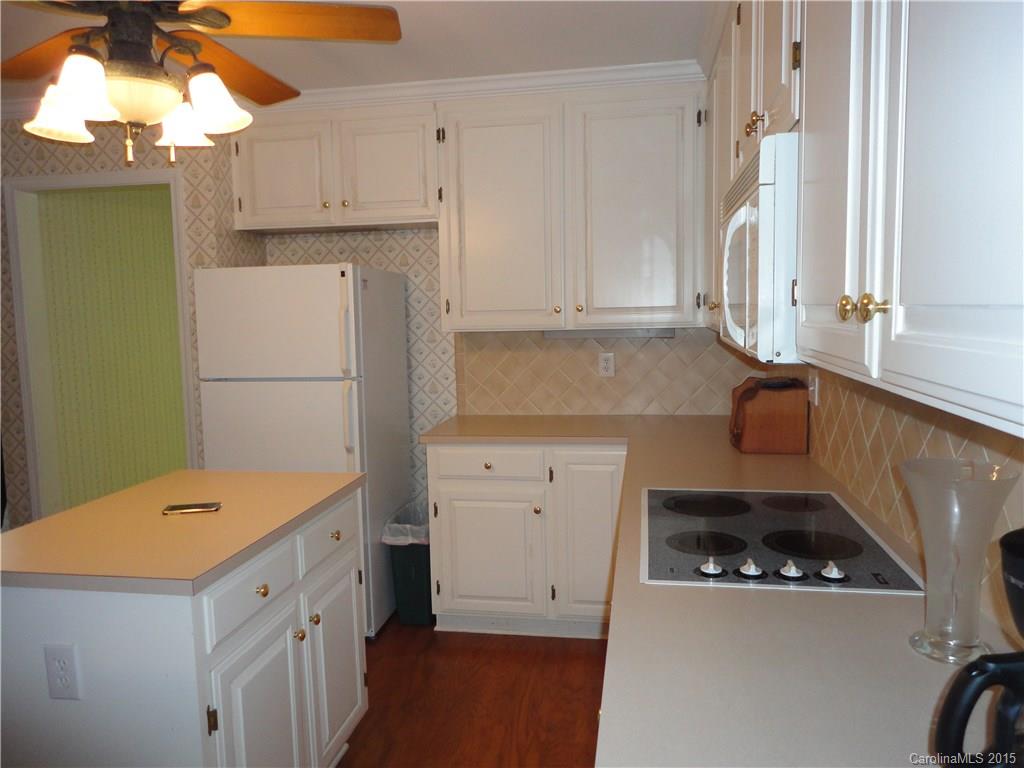 2675 Island View Road, Unit 1 Fort Mill, SC 29708 - Photo 24 of 24 a kitchen with a refrigerator and a sink