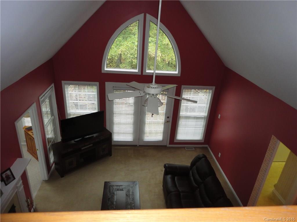 2675 Island View Road, Unit 1 Fort Mill, SC 29708 - Photo 6 of 24 a living room with furniture and a flat screen tv