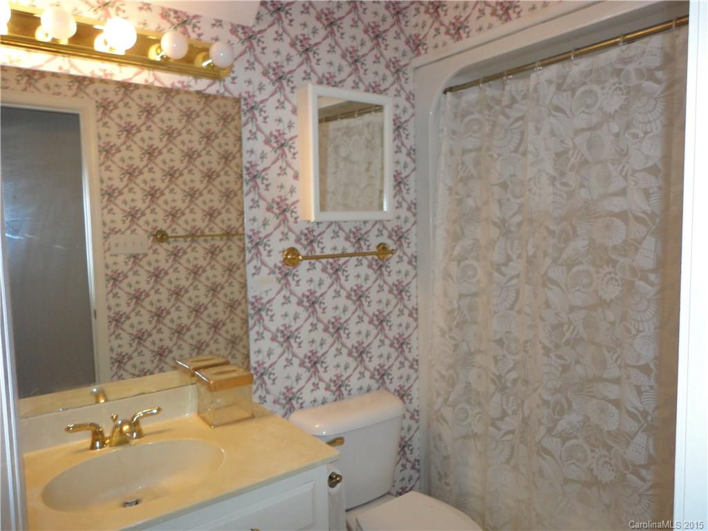 2675 Island View Road, Unit 1 Fort Mill, SC 29708 - Photo 7 of 24 a bathroom with a sink a toilet and shower