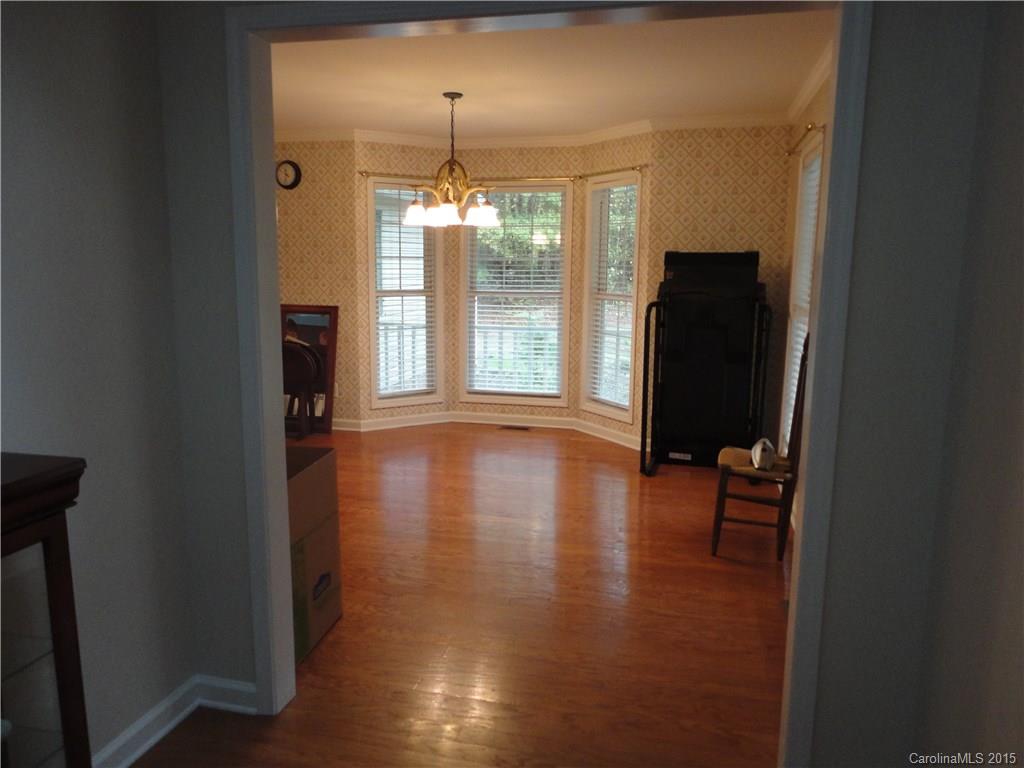 2675 Island View Road, Unit 1 Fort Mill, SC 29708 - Photo 9 of 24 wooden floor in an empty room with a window