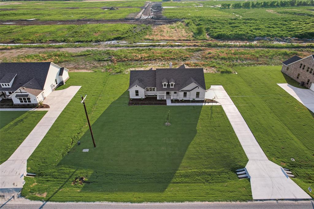 a view of a lake with a big yard