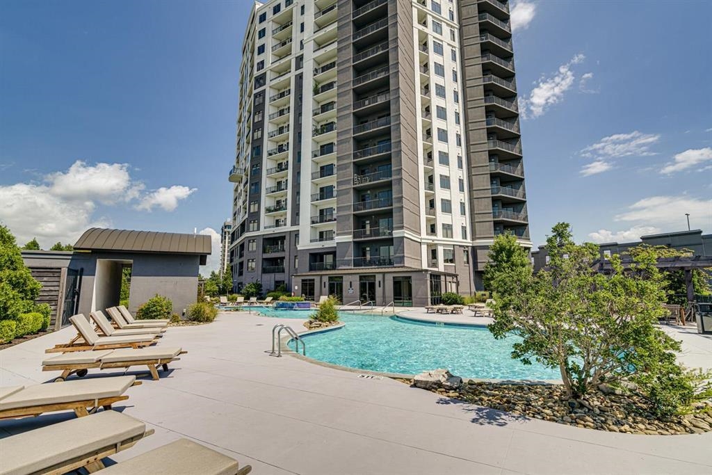 717 Riverside Drive, Unit 505 Memphis, TN 38103 - Photo 4 of 24 a view of tall buildings and a street view