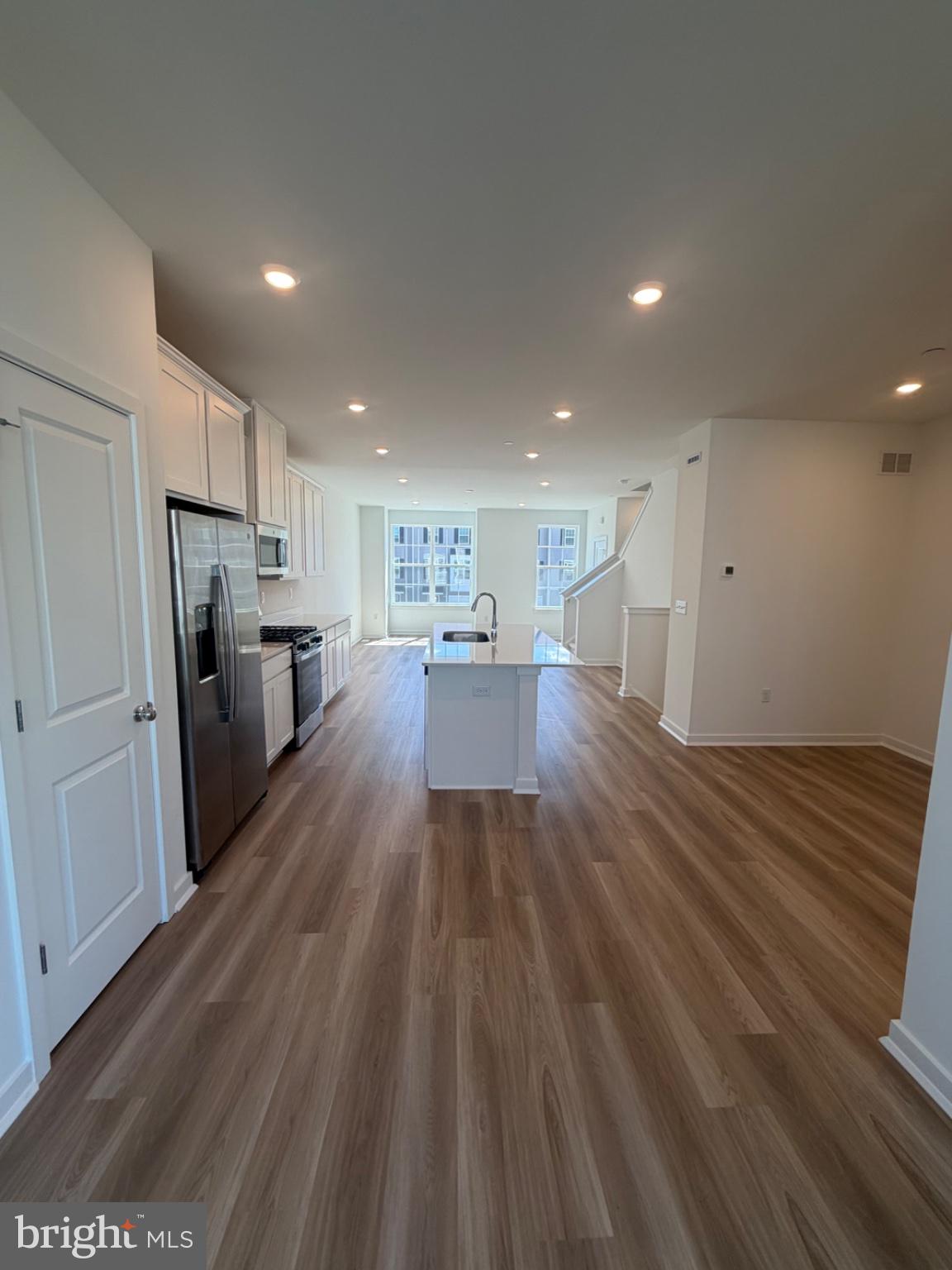 75 Morgans Ml Road Sicklerville, NJ 08081 - Photo 9 of 21 Spacious modern kitchen with light wood floors.
