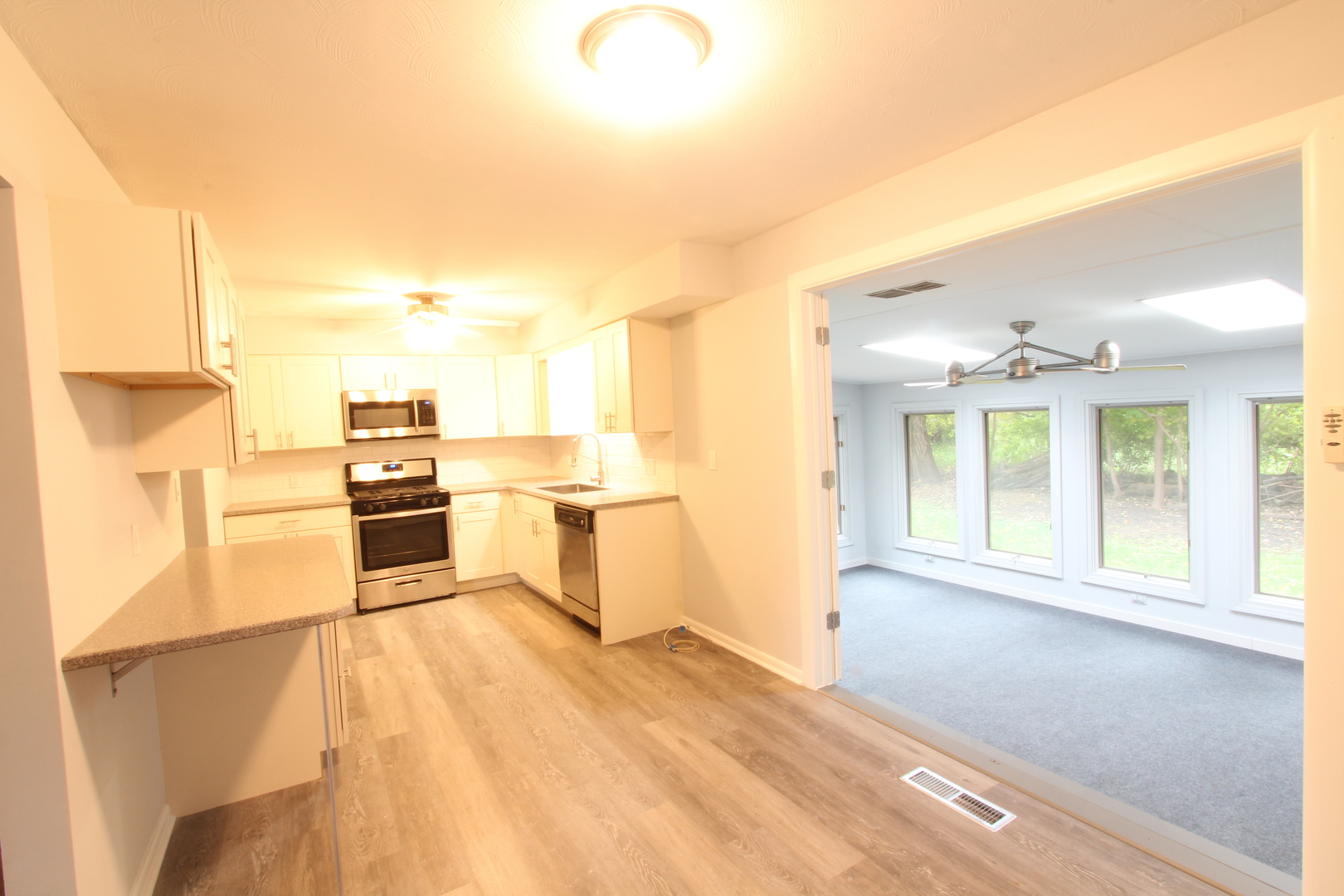 703 Sheridan Road Normal, IL 61761 - Photo 4 of 15 a view of a kitchen with a sink
