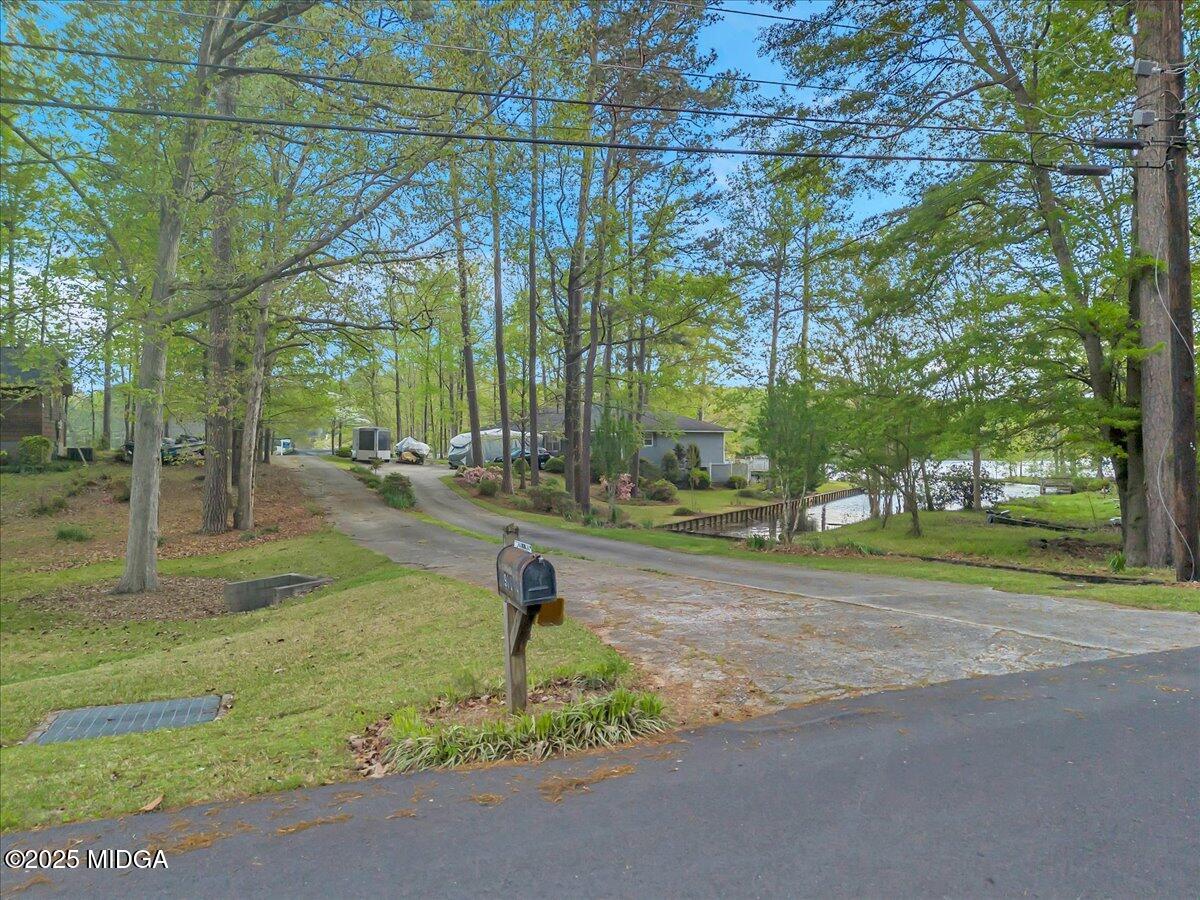 900 South Plantation Parkway Macon, GA 31220 - Photo 15 of 61 a fire hydrant in the middle of a yard