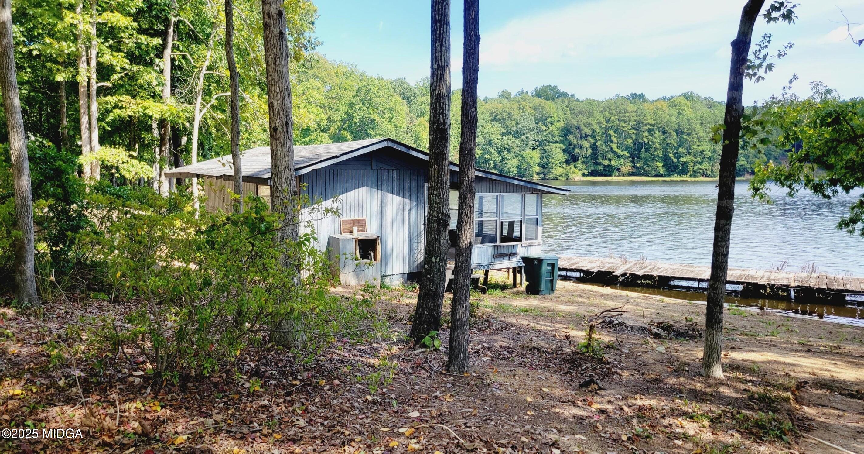 900 South Plantation Parkway Macon, GA 31220 - Photo 20 of 61 a front view of a house with a yard