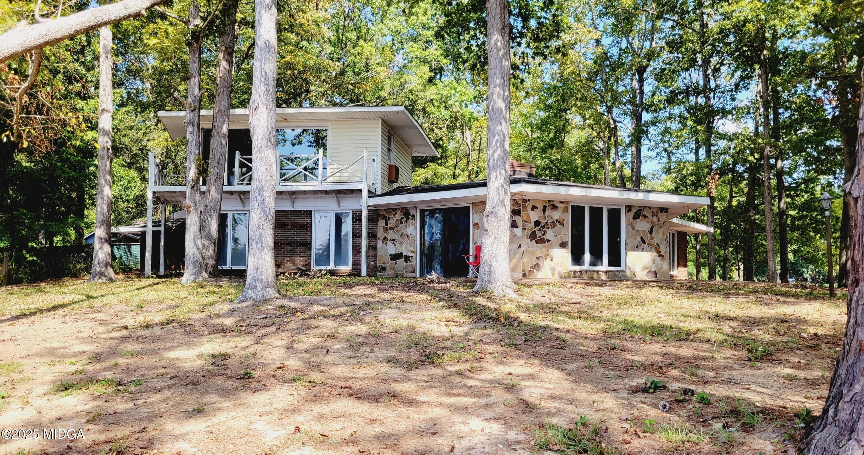 900 South Plantation Parkway Macon, GA 31220 - Photo 31 of 61 a front view of a house with a garden