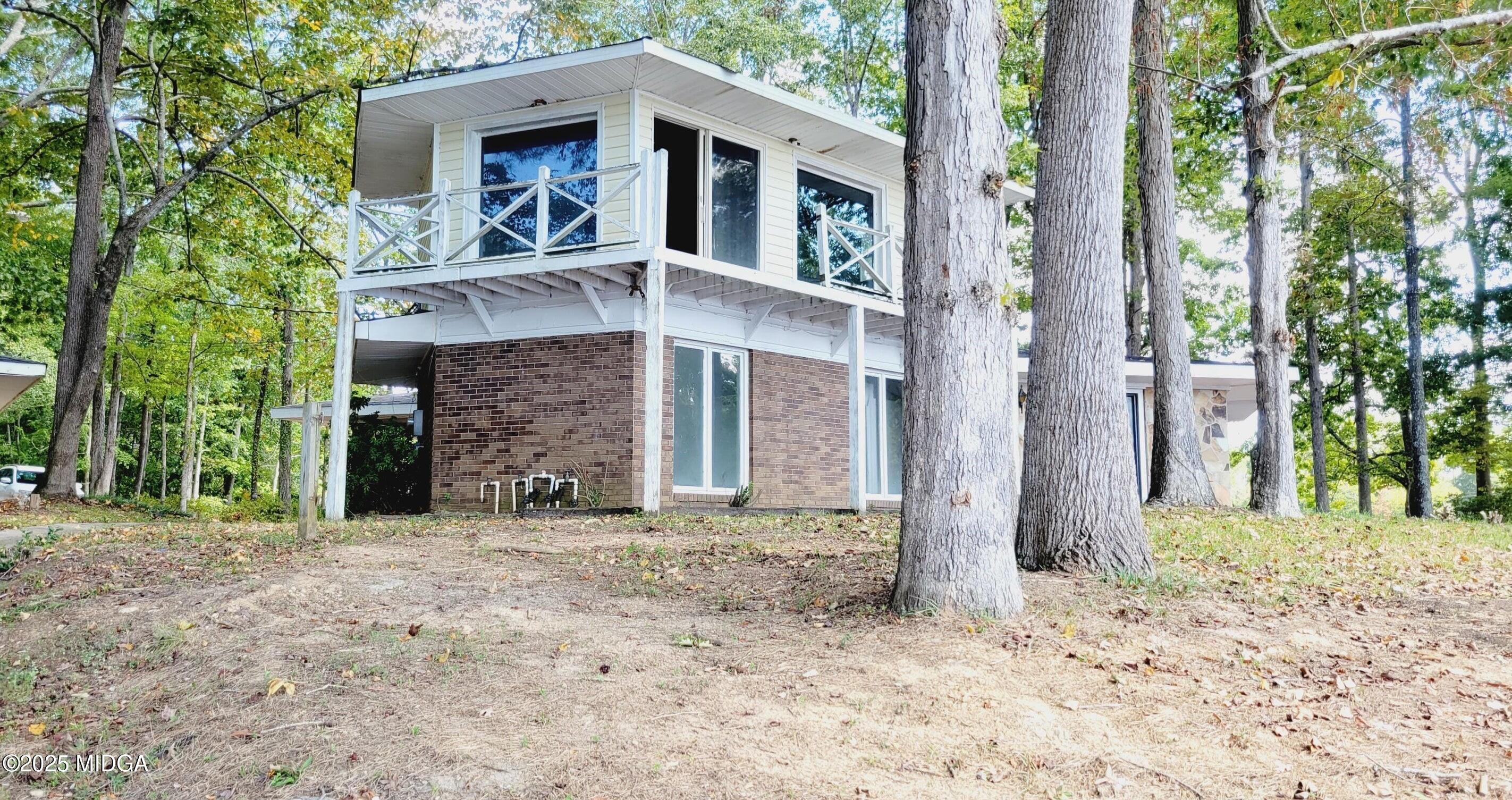 900 South Plantation Parkway Macon, GA 31220 - Photo 35 of 61 a front view of a house with a yard