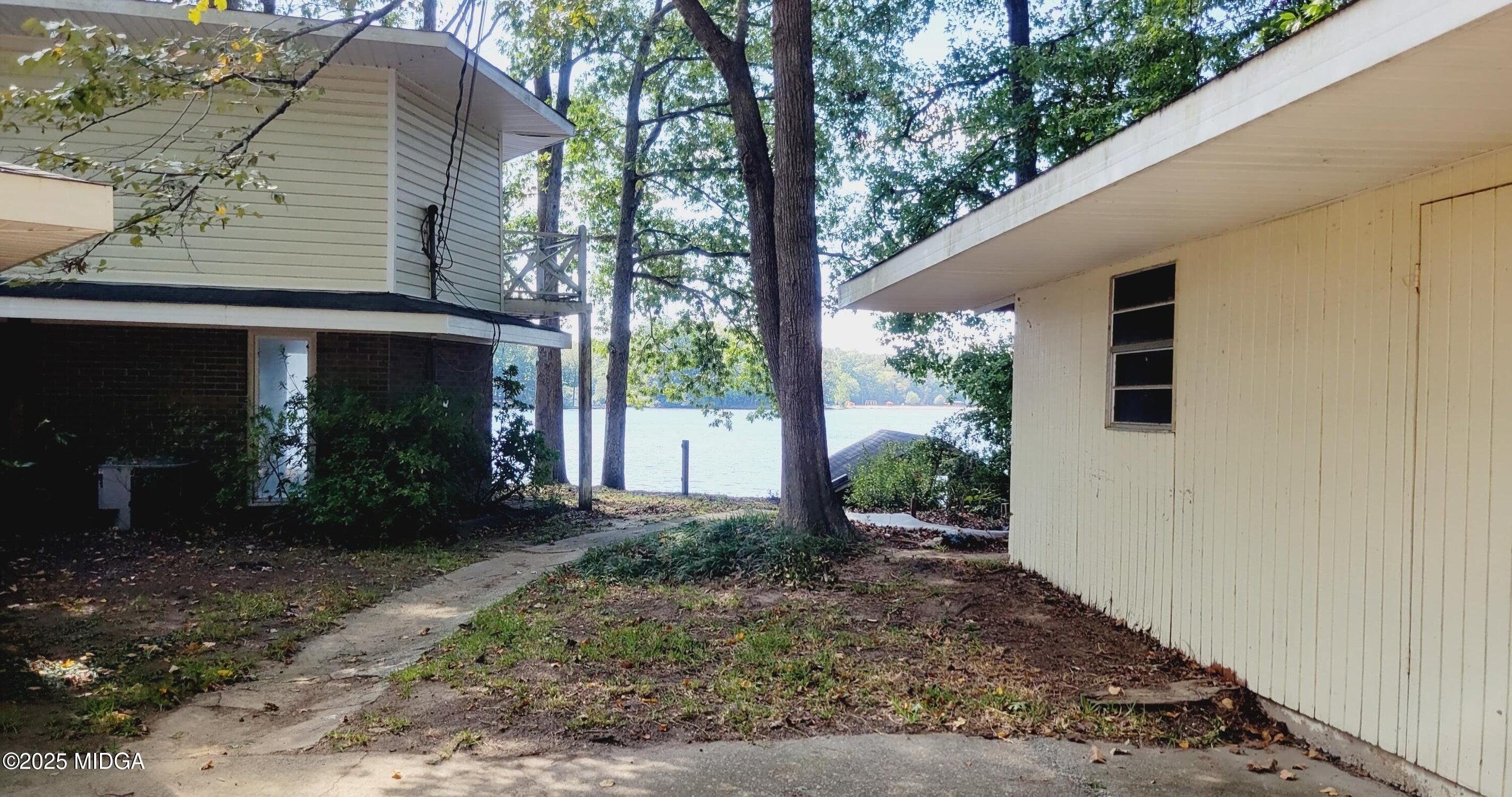 900 South Plantation Parkway Macon, GA 31220 - Photo 39 of 61 a view of a house with a yard
