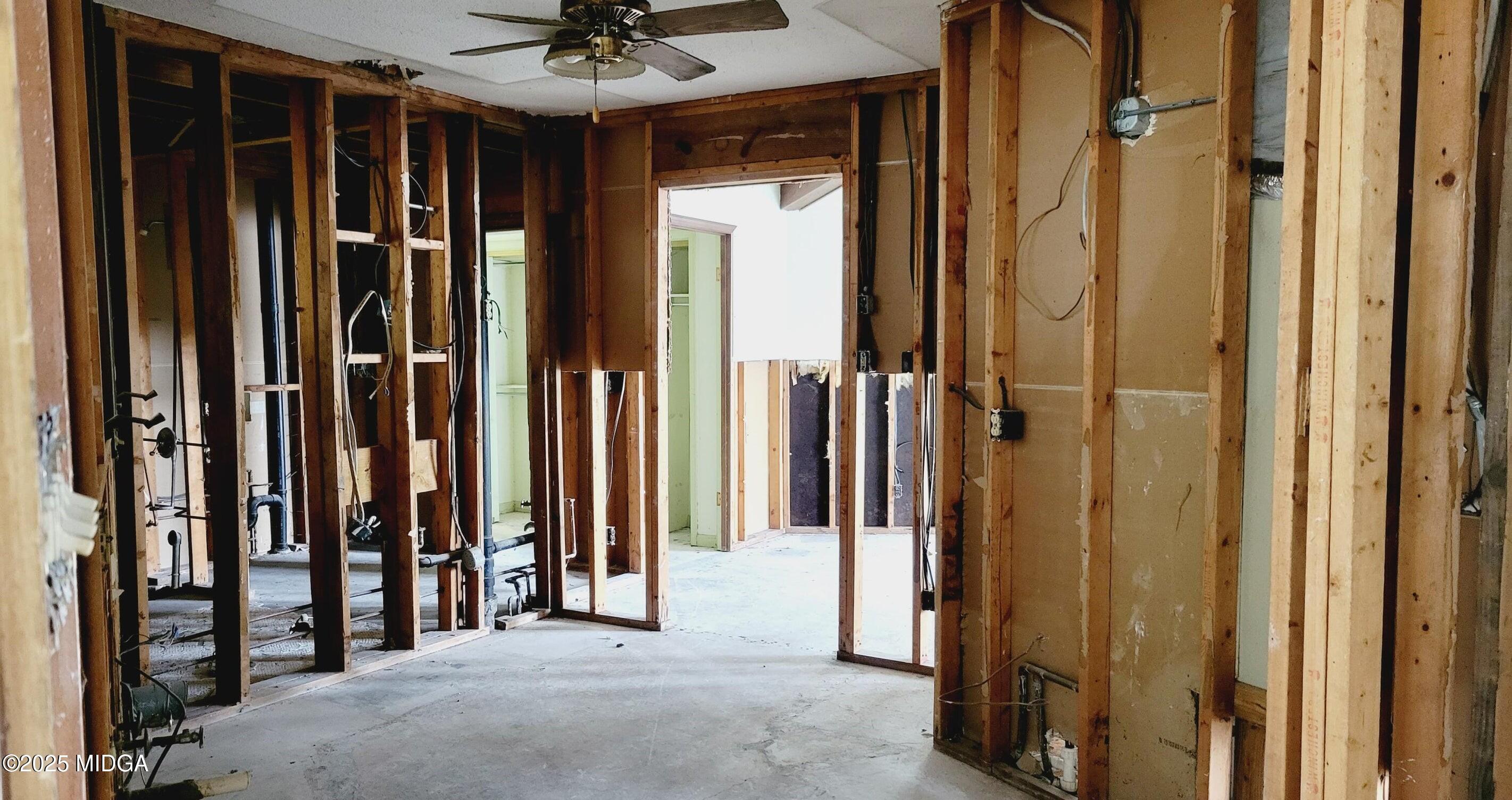 900 South Plantation Parkway Macon, GA 31220 - Photo 44 of 61 a view of a hallway with wooden floor and entryway