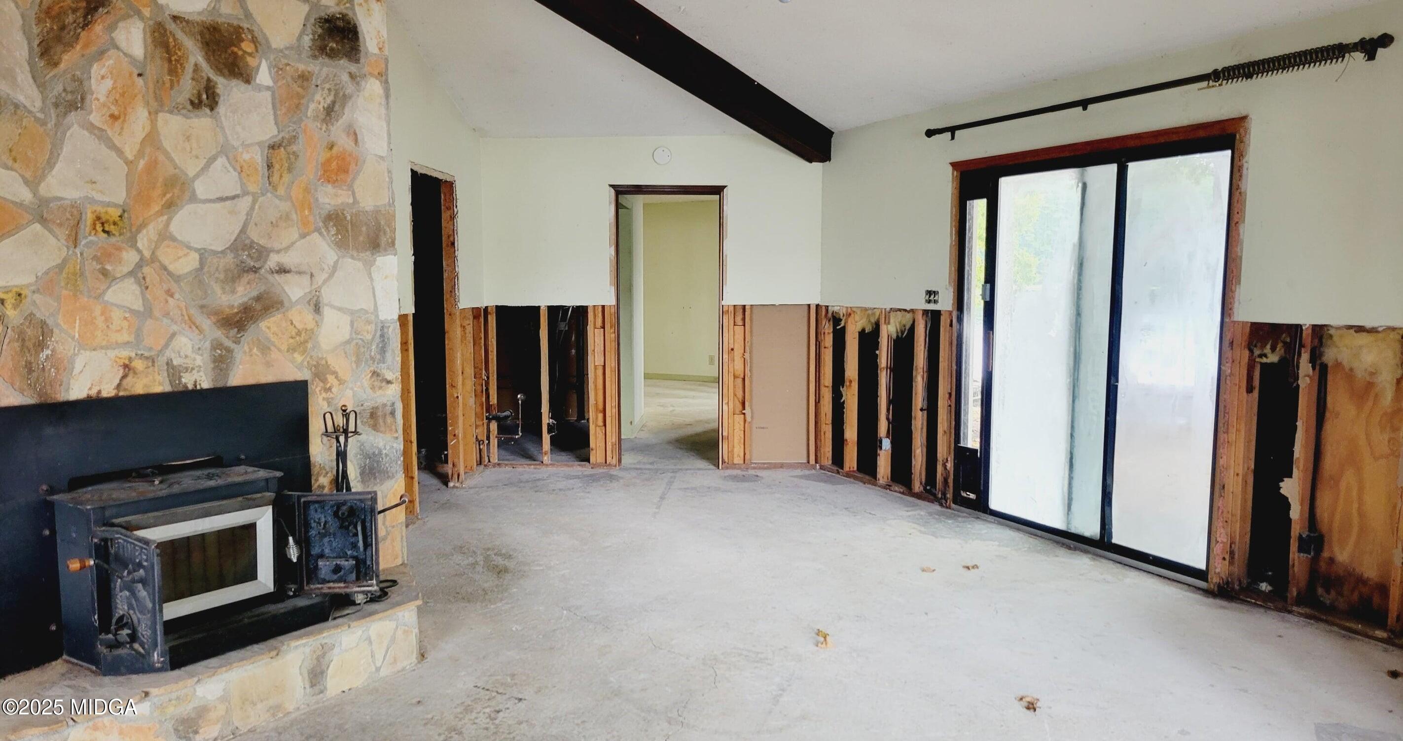 900 South Plantation Parkway Macon, GA 31220 - Photo 47 of 61 a view of an empty room with fireplace and a window