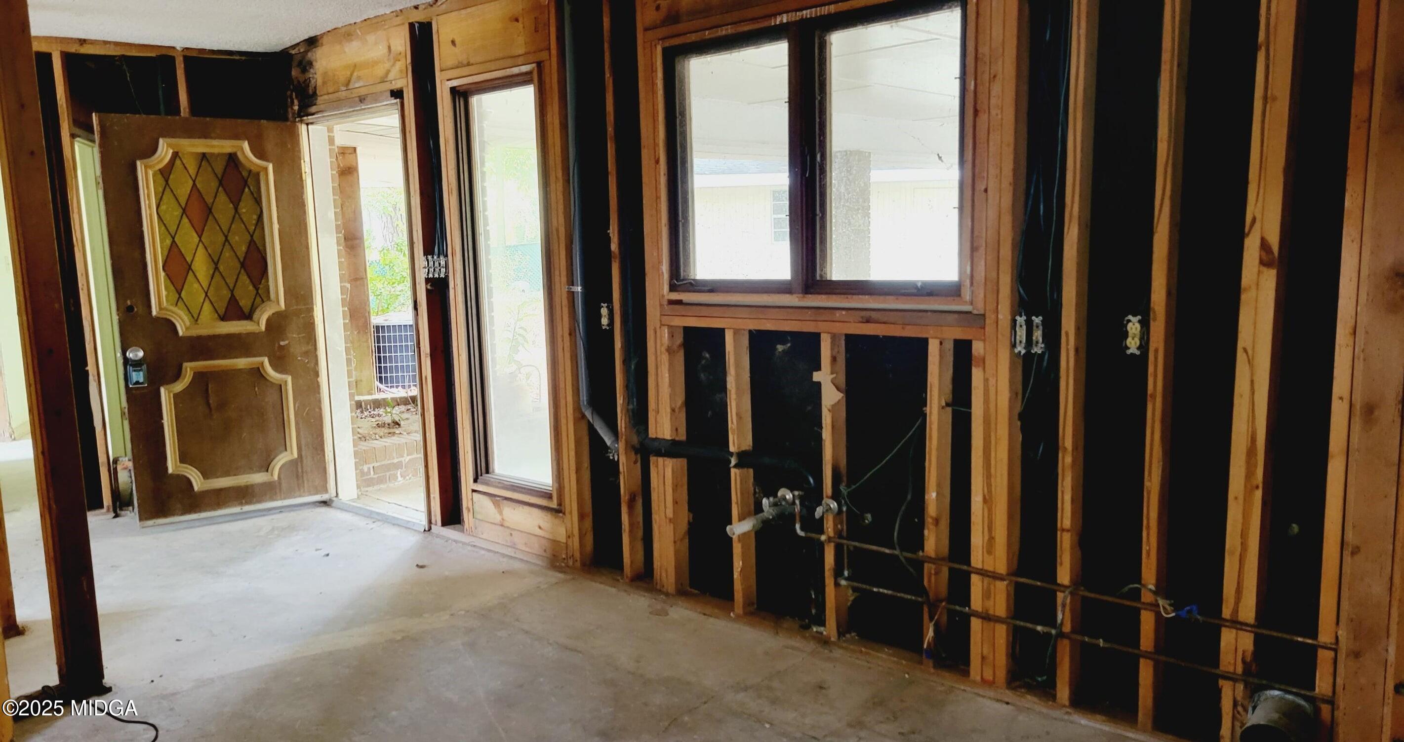 900 South Plantation Parkway Macon, GA 31220 - Photo 49 of 61 a view of front door with wooden floor