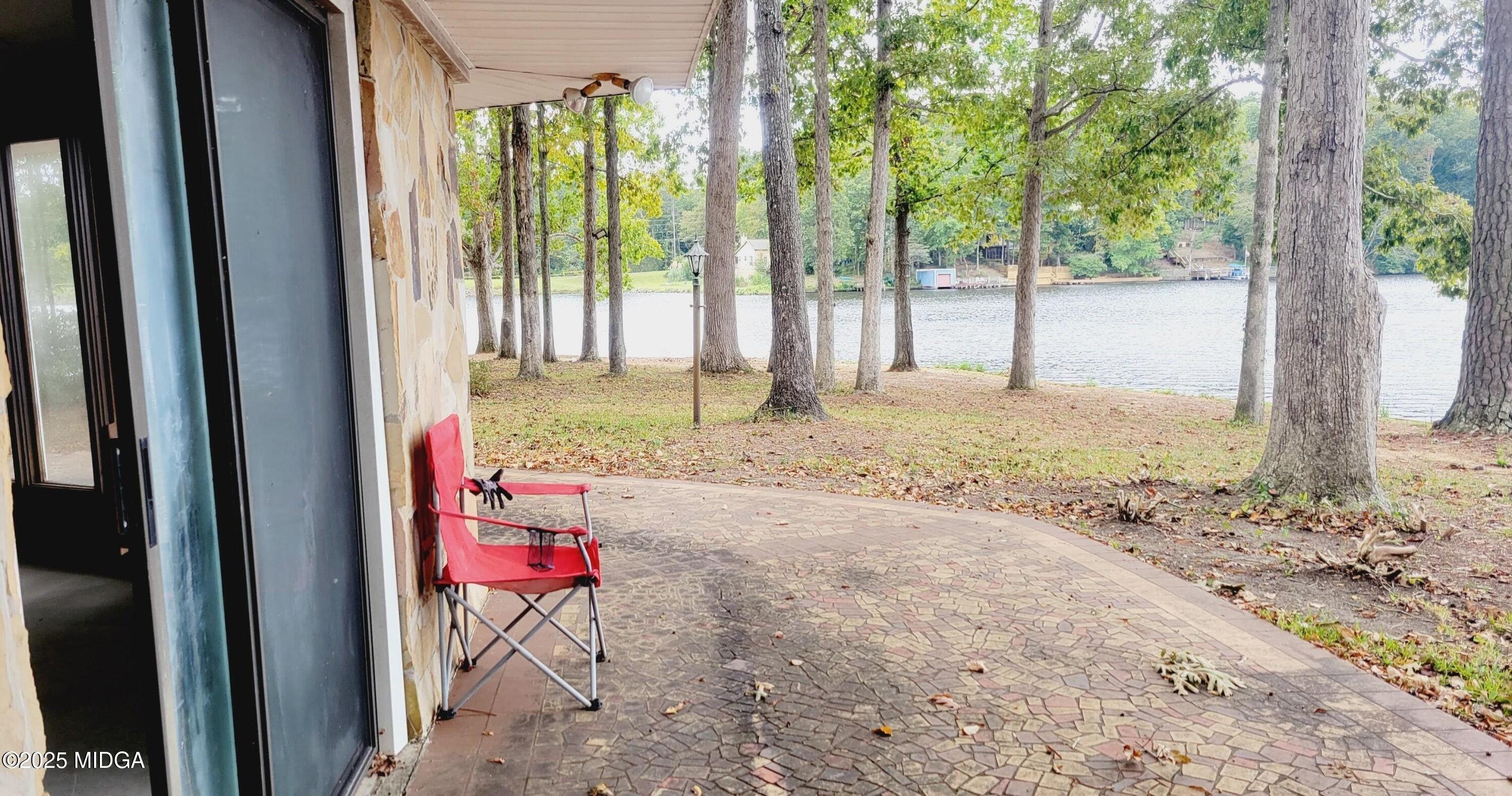 900 South Plantation Parkway Macon, GA 31220 - Photo 56 of 61 a backyard of a house with a yard and seating space