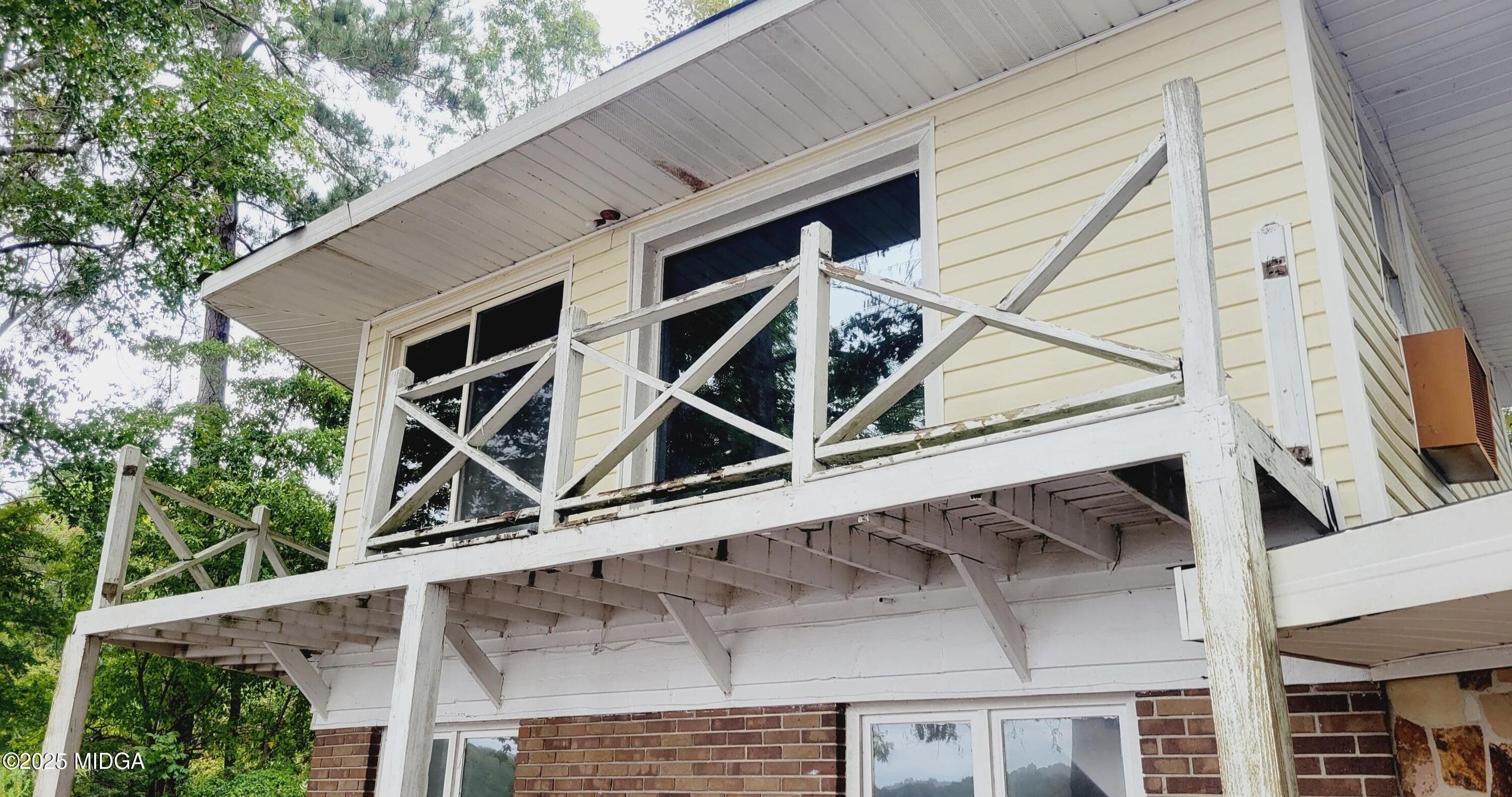 900 South Plantation Parkway Macon, GA 31220 - Photo 58 of 61 a roof deck with table and chairs