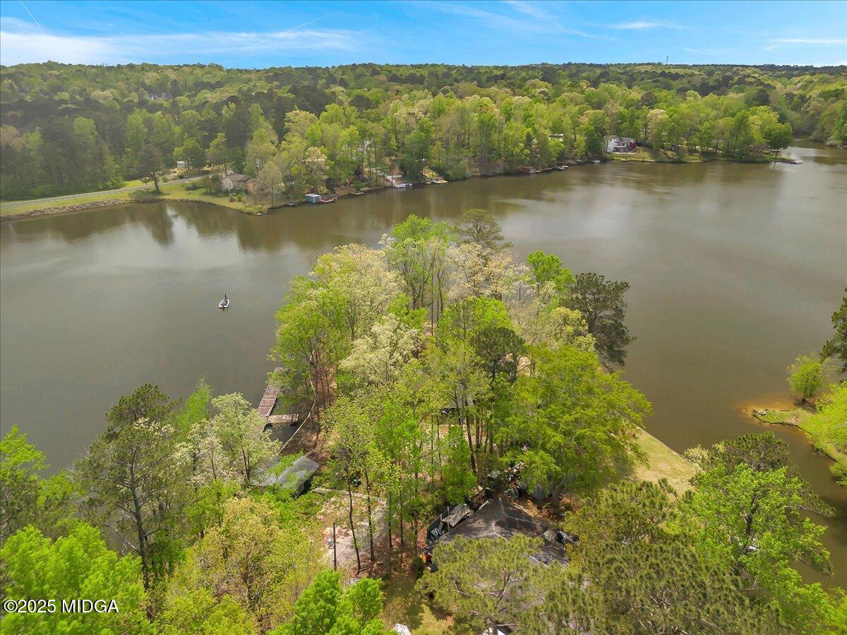 900 South Plantation Parkway Macon, GA 31220 - Photo 8 of 61 a view of a lake with a mountain in the background