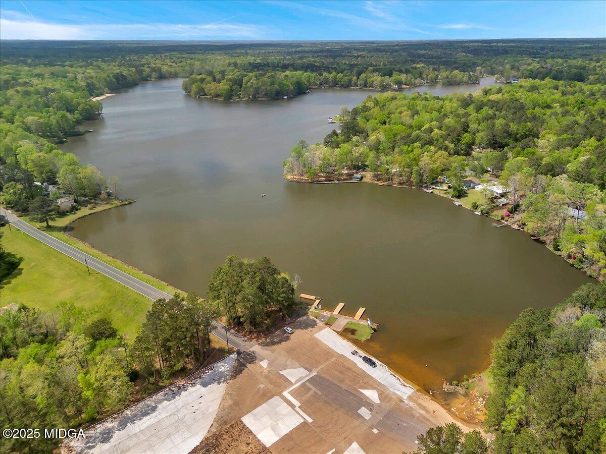 900 South Plantation Parkway Macon, GA 31220 - Photo 10 of 61 a view of a lake with a mountain in the background