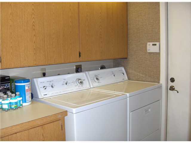 367 River Edge Road Jupiter, FL 33477 - Photo 12 of 17 a utility room with dryer and washer