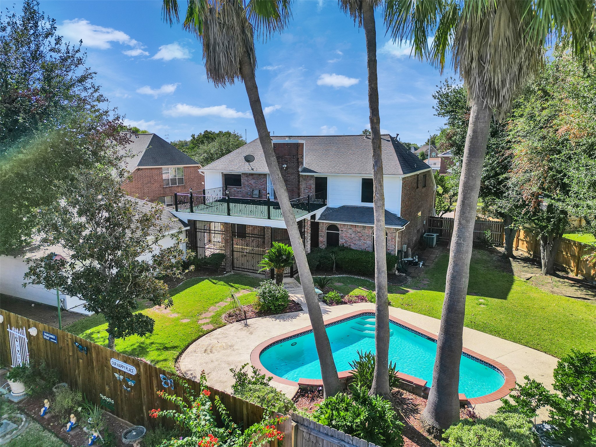 4414 Santee Drive Baytown, TX 77521 - Photo 2 of 50 aerial view of a house with swimming pool