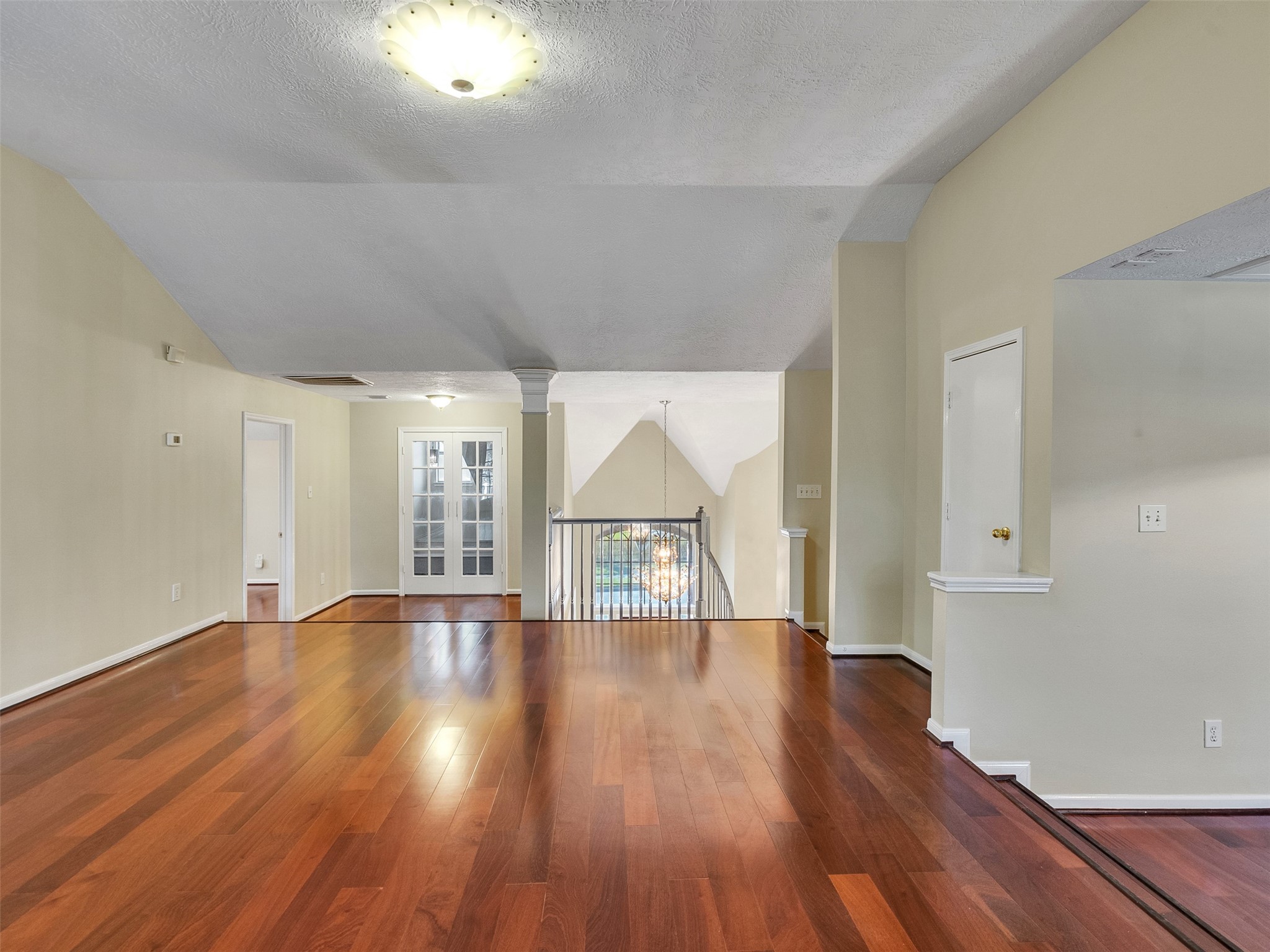 4414 Santee Drive Baytown, TX 77521 - Photo 30 of 50 a view of an empty room with wooden floor and a window