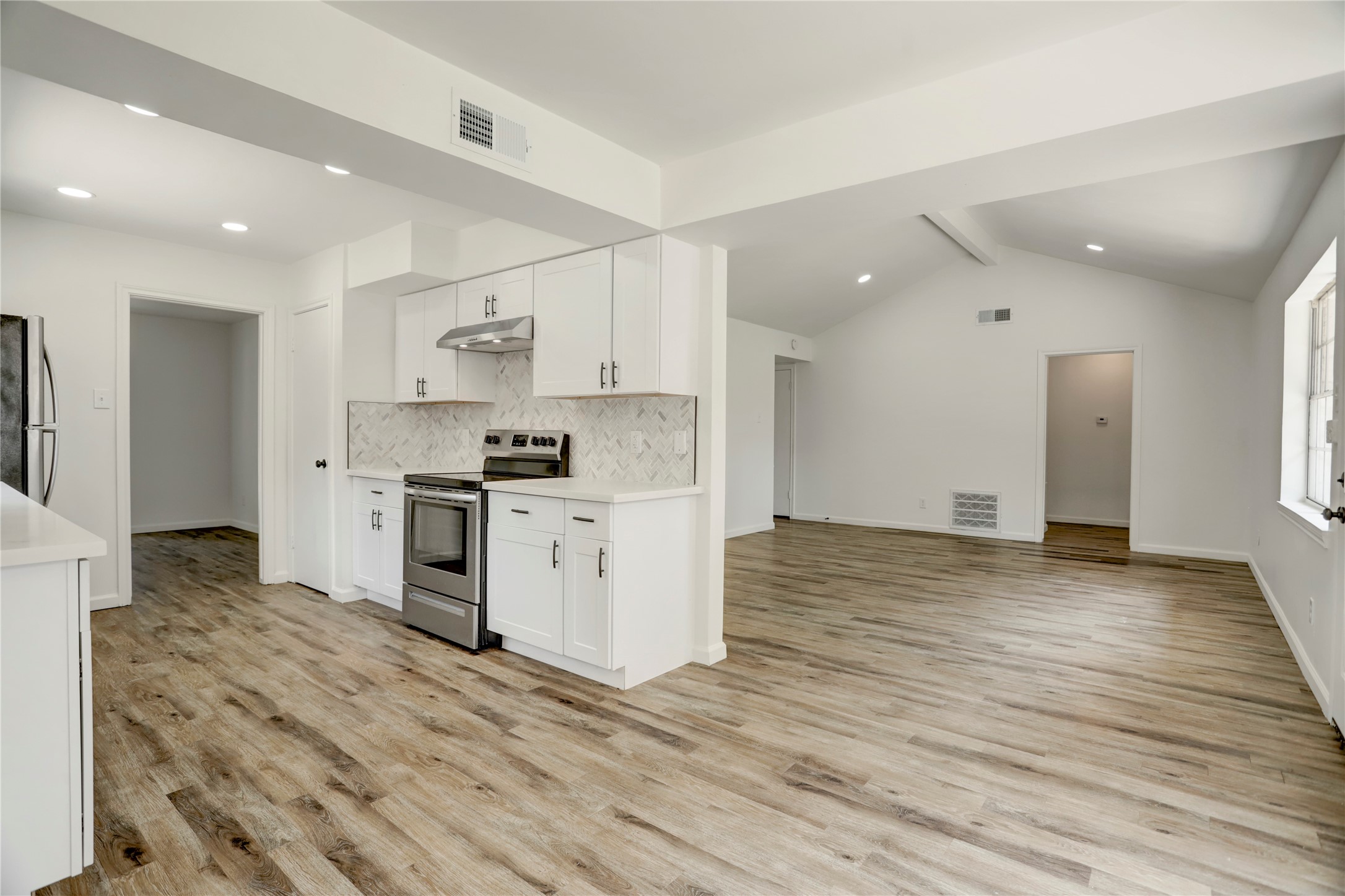 14035 Myrtlea Drive Houston, TX 77079 - Photo 13 of 38 The kitchen is open to the breakfast and living rooms.