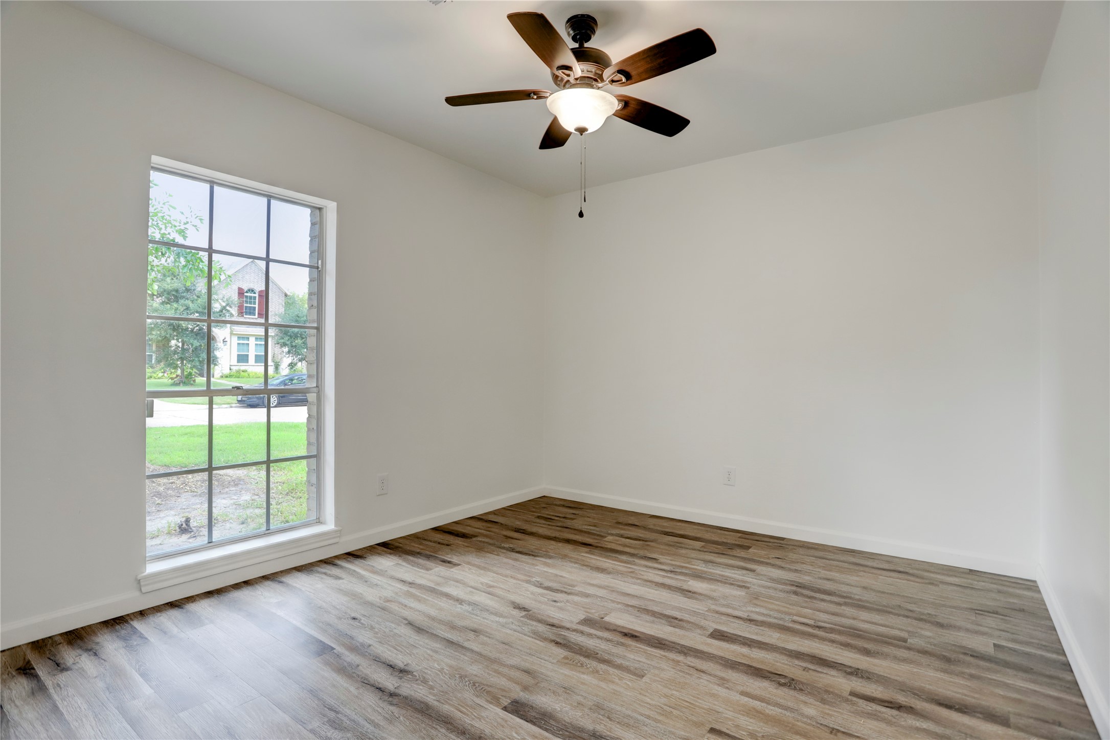 14035 Myrtlea Drive Houston, TX 77079 - Photo 24 of 38 LVP flooring extends into each of the bedrooms as well. There is no carpet in this home!