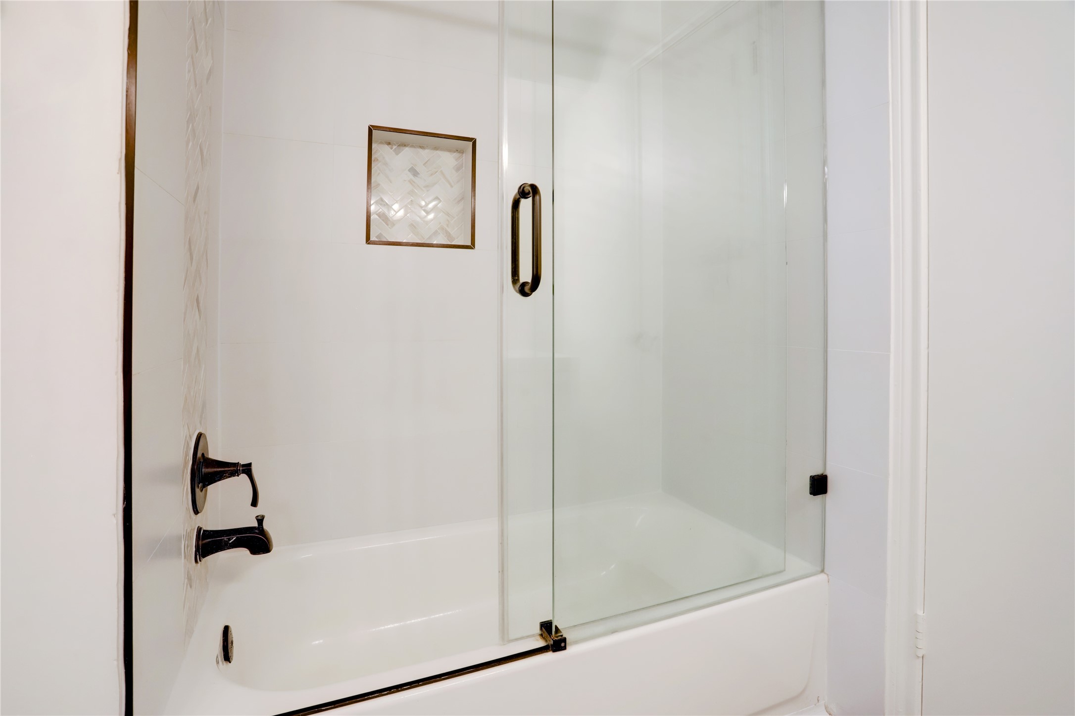 14035 Myrtlea Drive Houston, TX 77079 - Photo 28 of 38 Updated bath/shower in secondary bathroom.