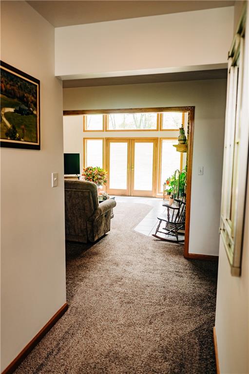 329 Breakiron Road Connellsville, PA 15425 - Photo 16 of 19 a spacious bedroom with a bed and a couch