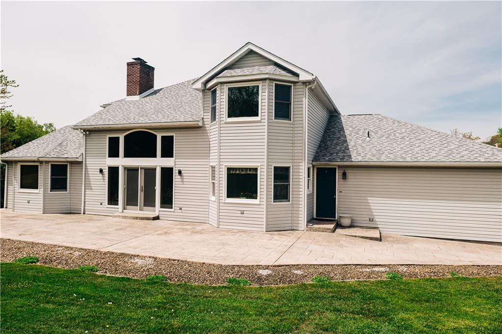 329 Breakiron Road Connellsville, PA 15425 - Photo 2 of 19 a front view of a house with a yard