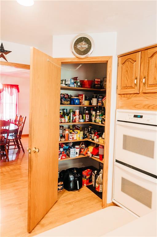 329 Breakiron Road Connellsville, PA 15425 - Photo 10 of 19 a view of walk in closet with clothes and shoes
