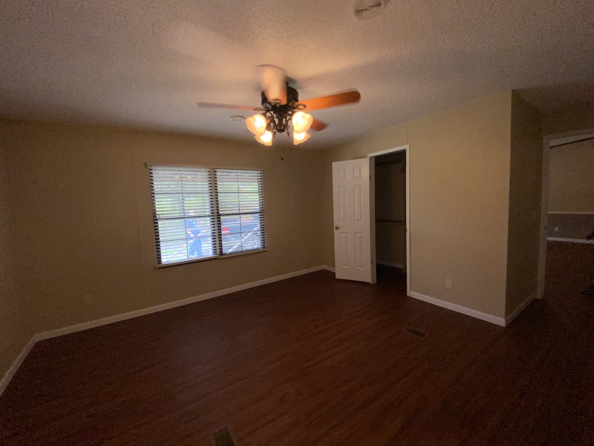 7106 Lake Road Northwest Fairview, TN 37062 - Photo 13 of 20 The Master Bedroom is large and located on one end of home while other 3 Bedrooms are located on complete other side.