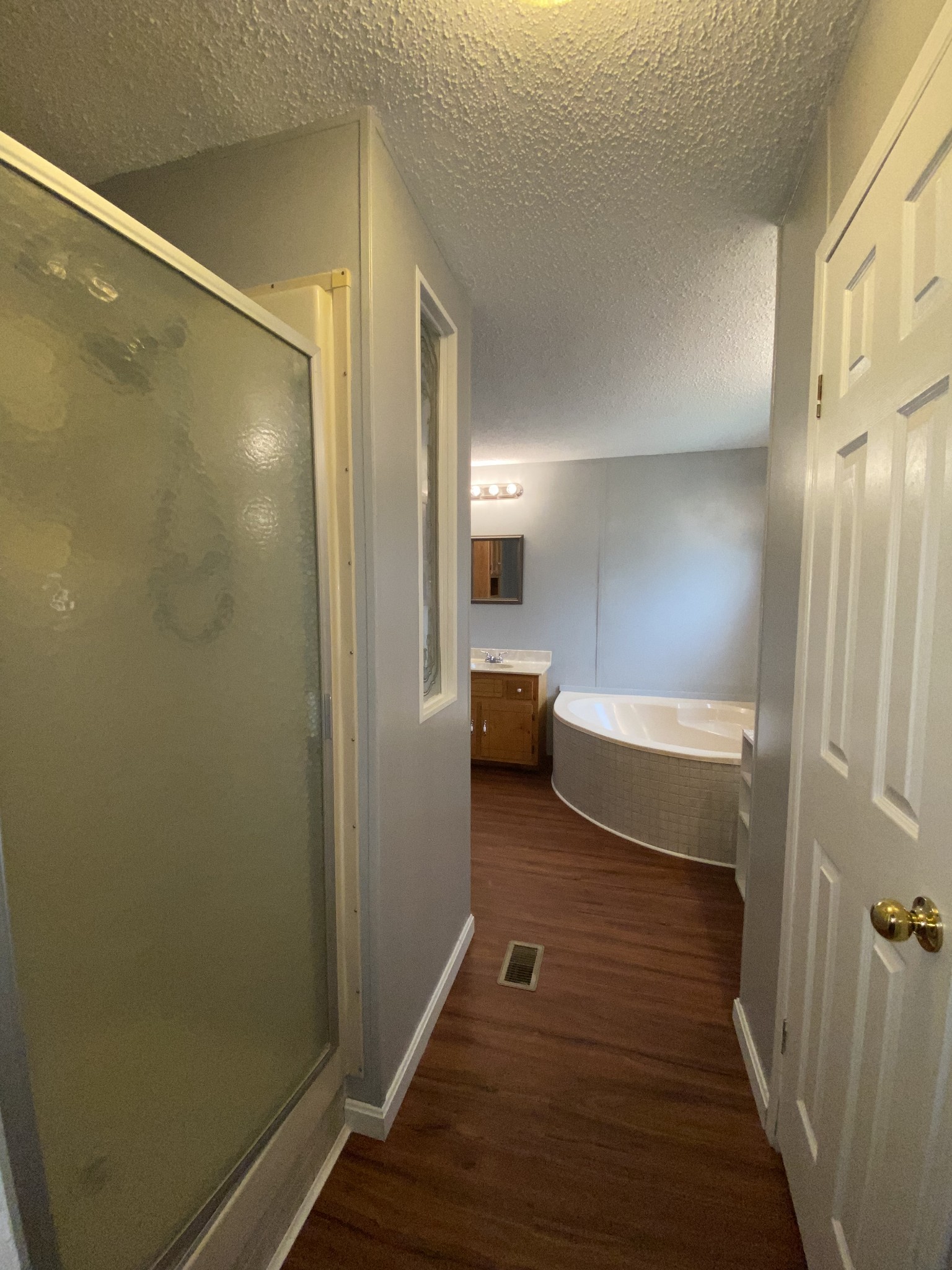 7106 Lake Road Northwest Fairview, TN 37062 - Photo 15 of 20 The entrance to the Master Bath. There is a shower, garden tub, storage closet and 2 vanities