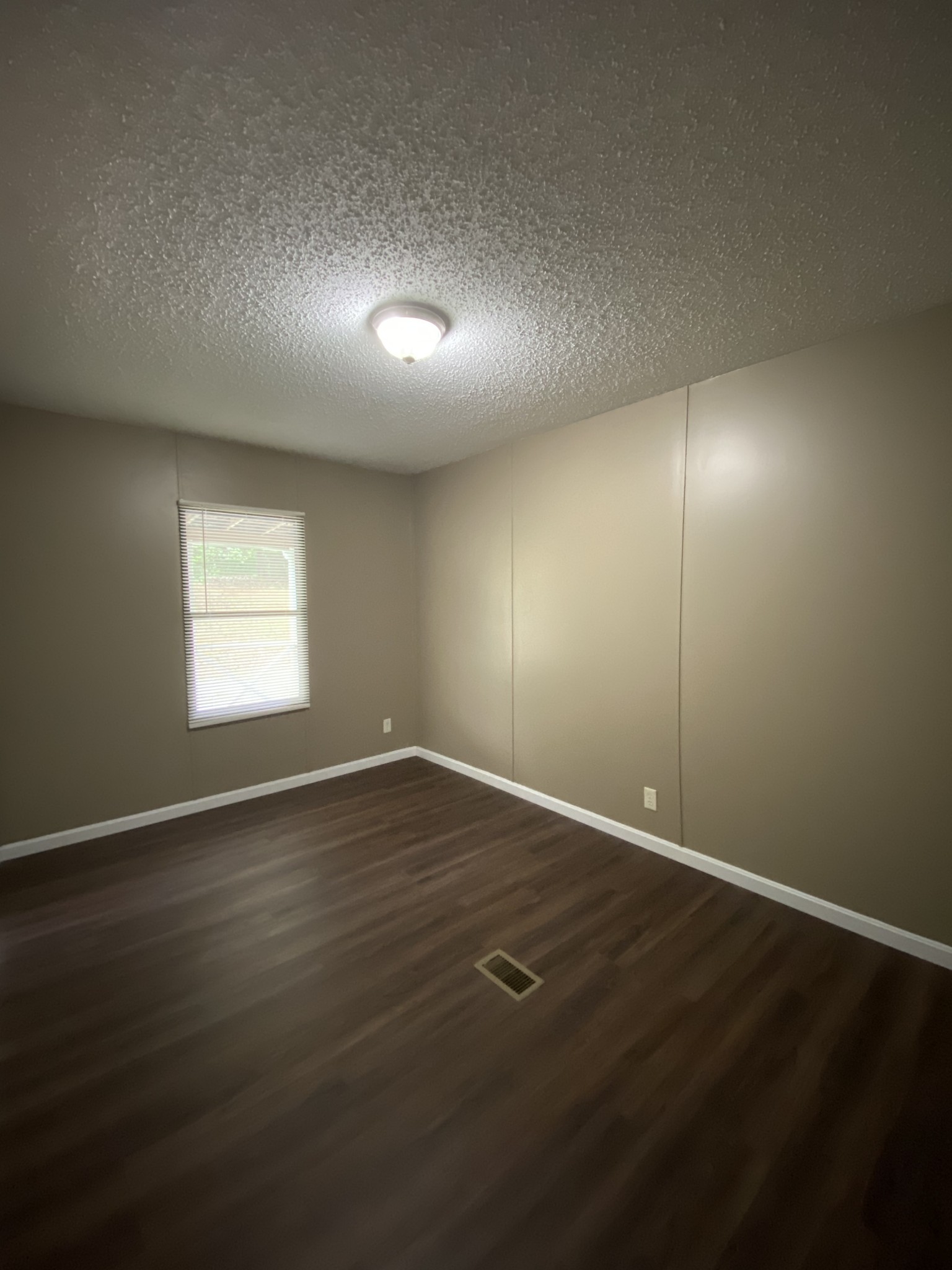 7106 Lake Road Northwest Fairview, TN 37062 - Photo 18 of 20 Bedroom 3 measures 9x13 - has a walk-in closet with built in shelving and laminate flooring
