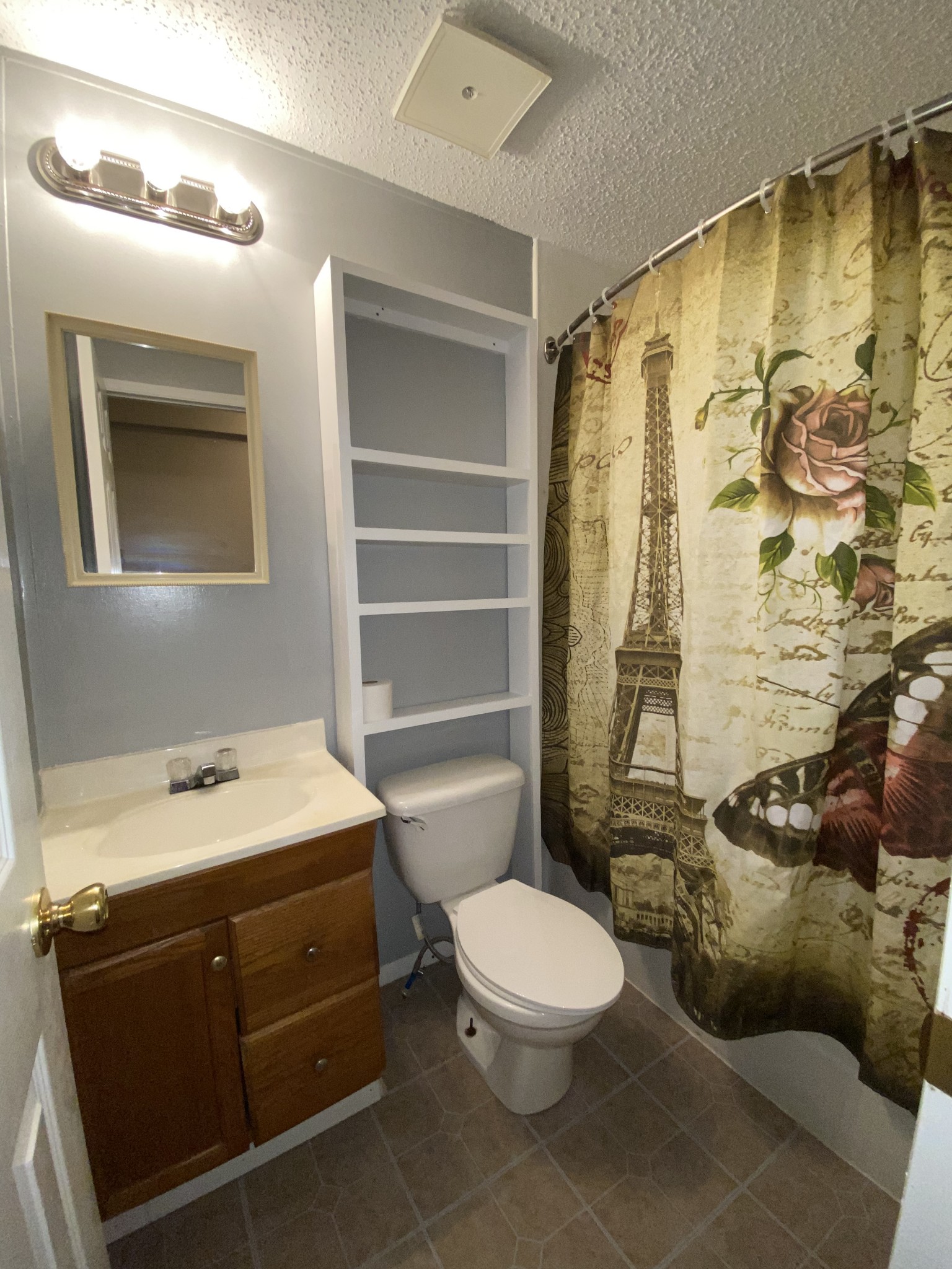 7106 Lake Road Northwest Fairview, TN 37062 - Photo 19 of 20 The Hallway Bath has a tub/shower combo. Located between Bedrooms 3 & 4