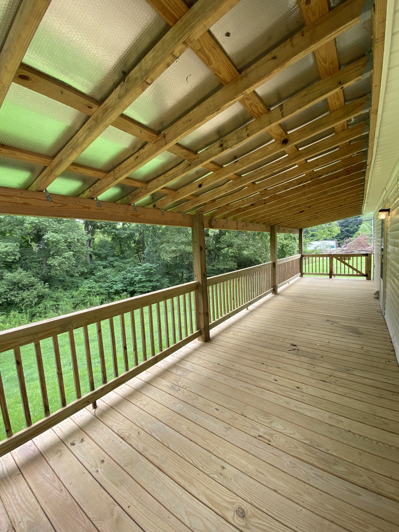 7106 Lake Road Northwest Fairview, TN 37062 - Photo 6 of 20 The back covered deck was added just few years ago. There are 2 doors leading to the deck... 1 from Kitchen and 1 from Laundry Room