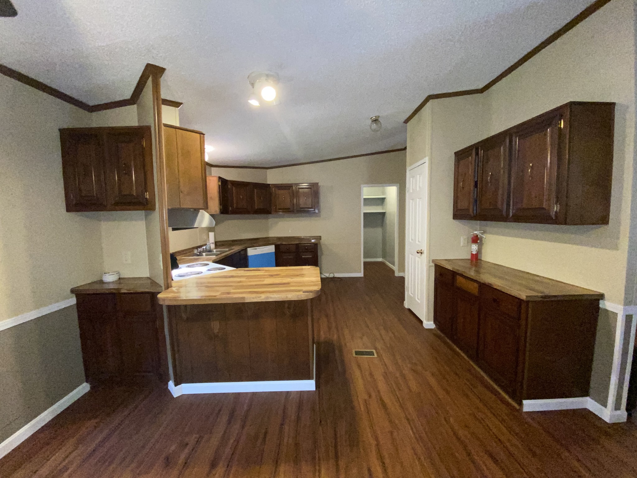 7106 Lake Road Northwest Fairview, TN 37062 - Photo 8 of 20 The Spacious Kitchen is centrally located on back side of the home. Lots of cabinetry for storage as well as a Pantry!
