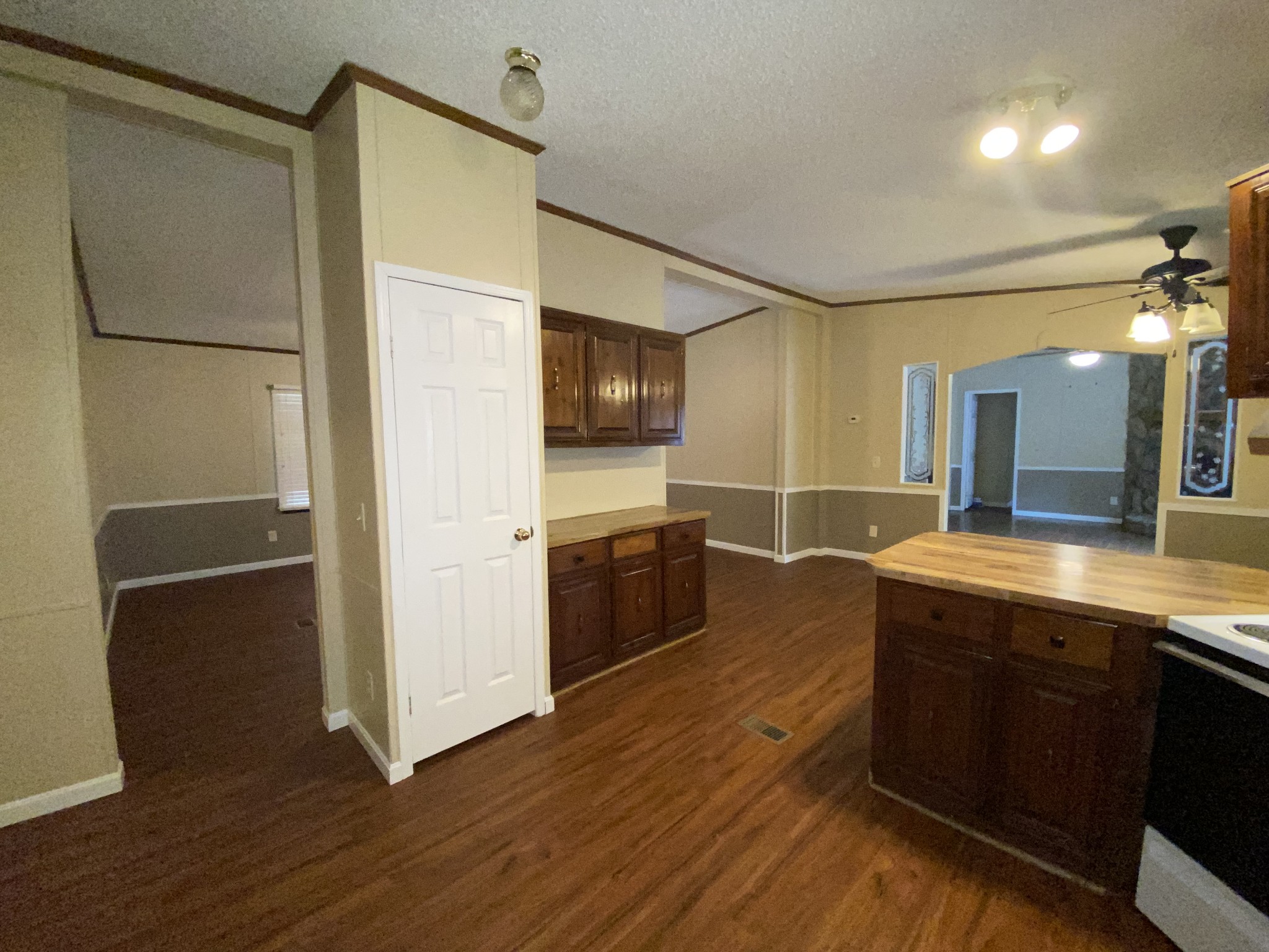 7106 Lake Road Northwest Fairview, TN 37062 - Photo 10 of 20 Another view of the Kitchen. 2 Large openings lead to the Living Room. The arched doorway leads to the Den