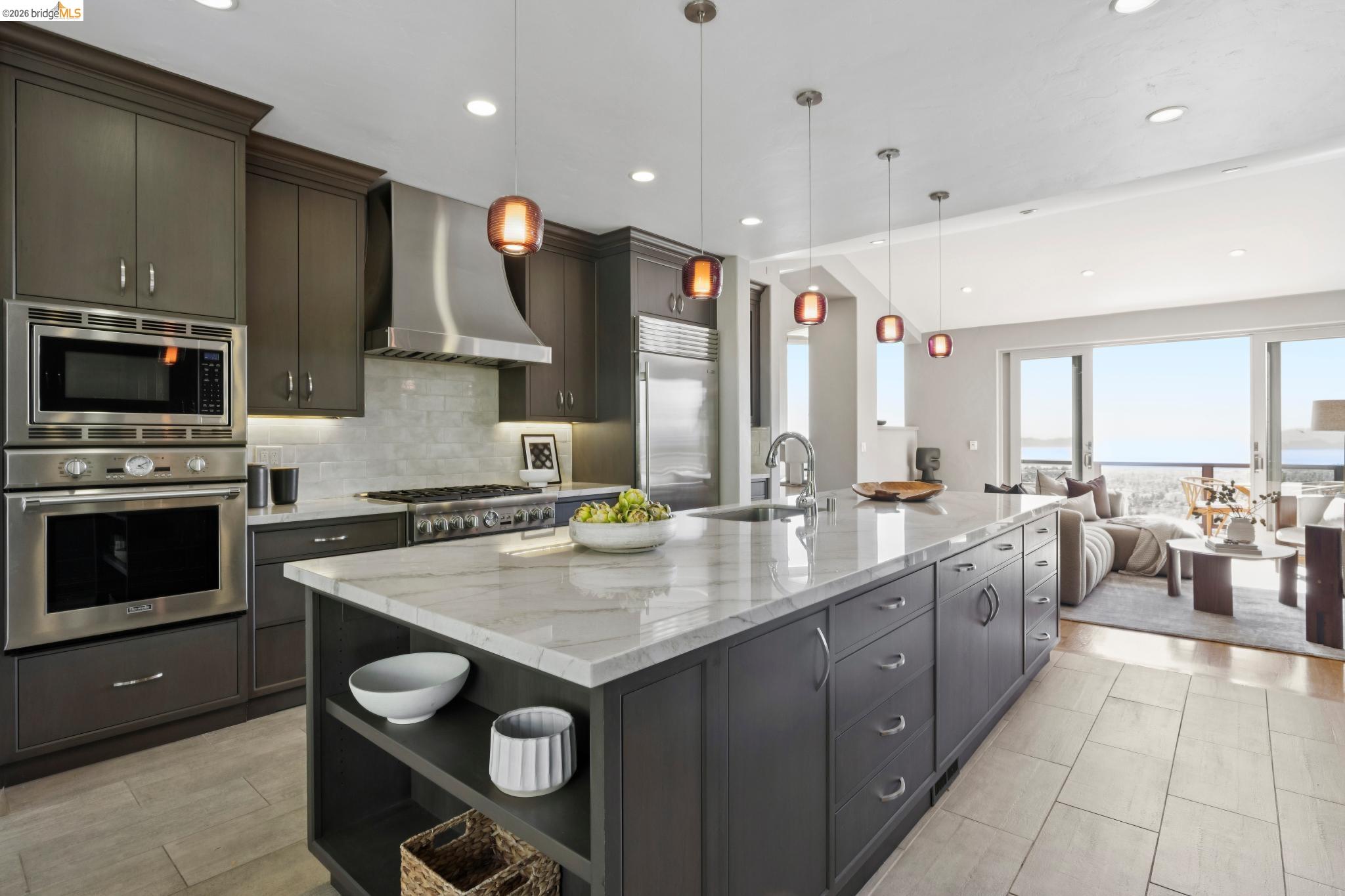 1426 Grand View Drive Berkeley, CA 94705 - Photo 23 of 55 Remodeled kitchen looking towards the outdoor patio